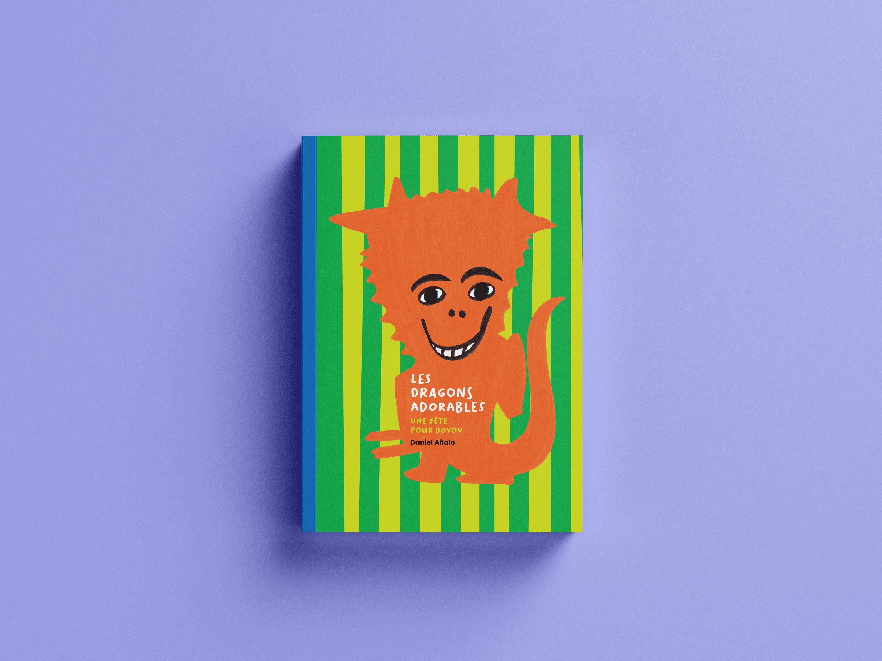 Couverture du livre Les Dragons Adorables de Daniel Alfako avec un dragon orange souriant sur des rayures vertes et jaunes